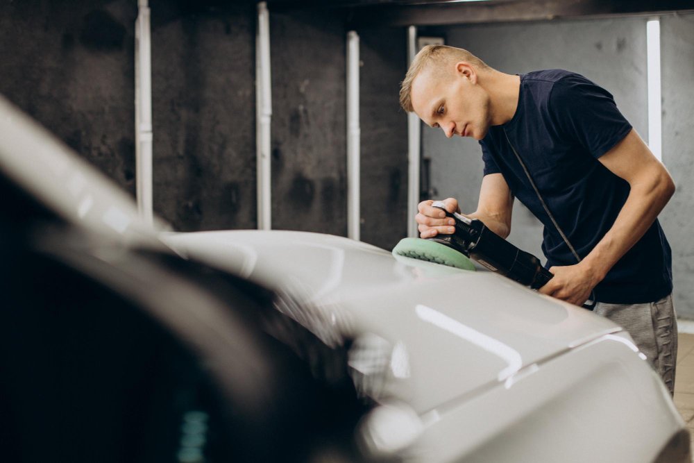 man-polishing-car-with-orbital-applicator.jpg